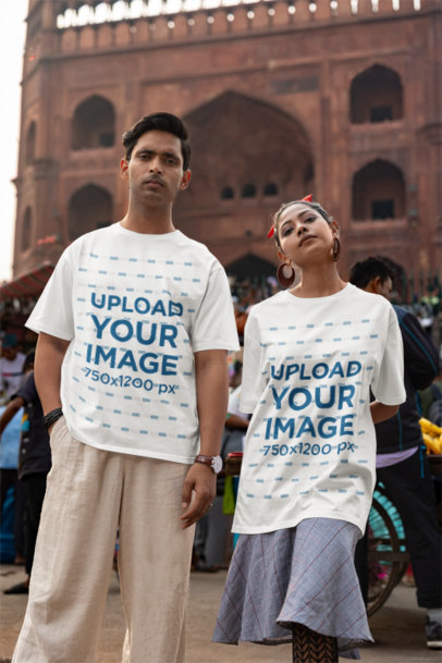 Blinkstore T-Shirt Mockup Featuring a Man and a Woman Standing in a Street Market