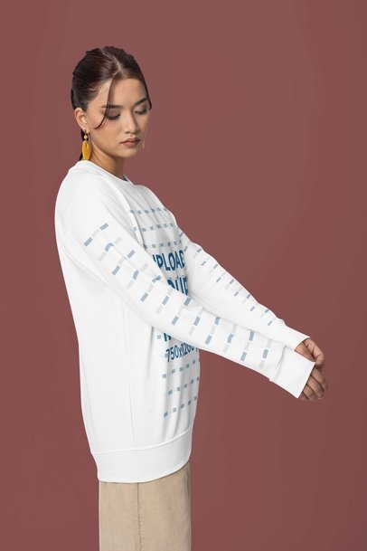 Sweatshirt Mockup Featuring a Woman Posing Against a Colorful Background