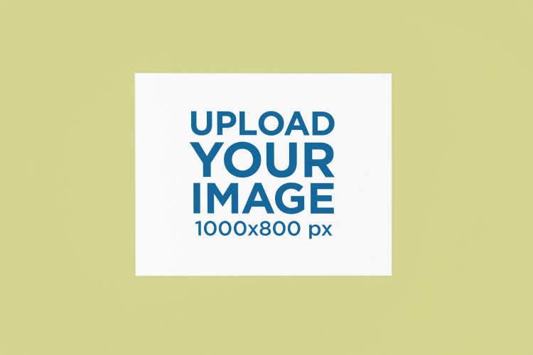 Mockup of a Horizontal Canvas Art Print Placed on a Colored Surface