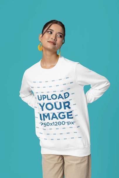 Mockup Featuring a Smiling Woman Wearing a Rounded-Neck Sweatshirt in a Studio