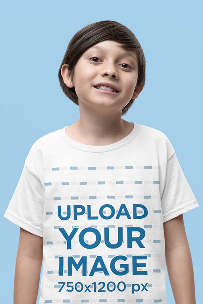 Mockup of a Smiling Boy Wearing a Rounded-Neck Gildan Tee in a Studio m37687