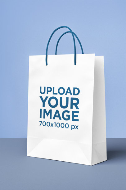 AI-Created Mockup of a Gift Bag Placed on a Colorful Surface