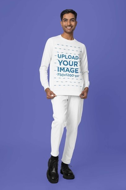 Mockup of a Smiling Man Showing His Round-Neck Sweatshirt in a Studio m37755