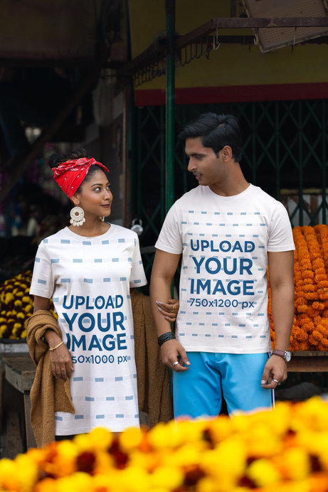Scott International T-Shirt and T-Shirt Dress Mockup Featuring a Man and Woman in a Street Market