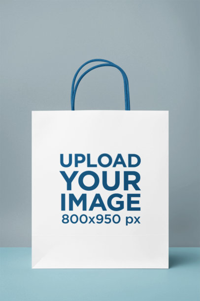 Mockup of an AI-Created Gift Bag Placed on a Plain Colorful Background m37180