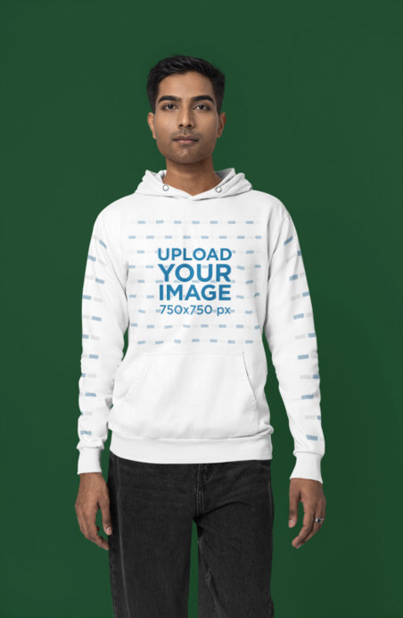 Gildan Hoodie Mockup Featuring a Man With a Serious Look Standing in a Studio