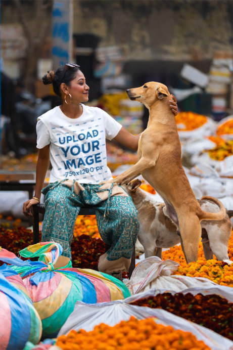 Scott International T-Shirt Mockup of a Smiling Woman Petting a Dog in a Street Market