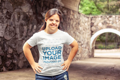 T-Shirt Mockup Featuring a Woman Standing on a Dry Water Channel