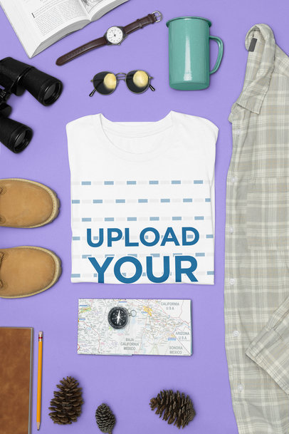 Outfit Mockup Featuring a Round-Neck Bella Canvas T-Shirt Next to Binoculars and a Map