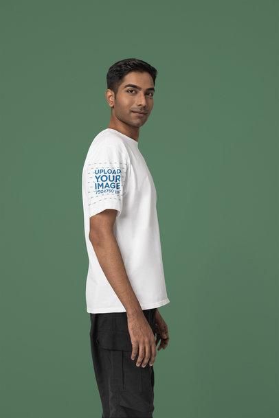 T-Shirt Sleeve Mockup of a Smiling Man Wearing a Blinkstore Tee in a Studio