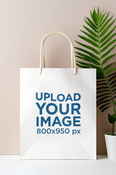 Mockup of an AI-Generated Gift Bag Placed on a Table With Some Plants