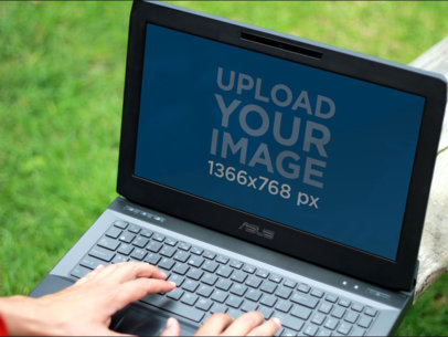 Mockup of an Asus Laptop in the Garden