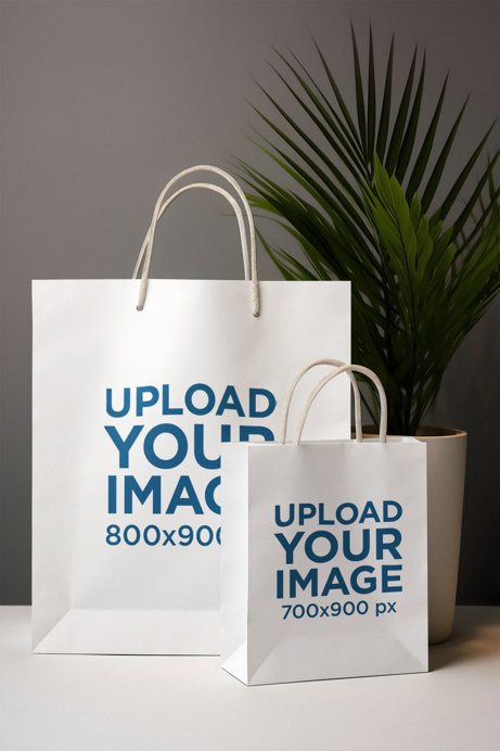 Mockup of Two AI-Created Gift Bags Placed on a Table Next to a Plant