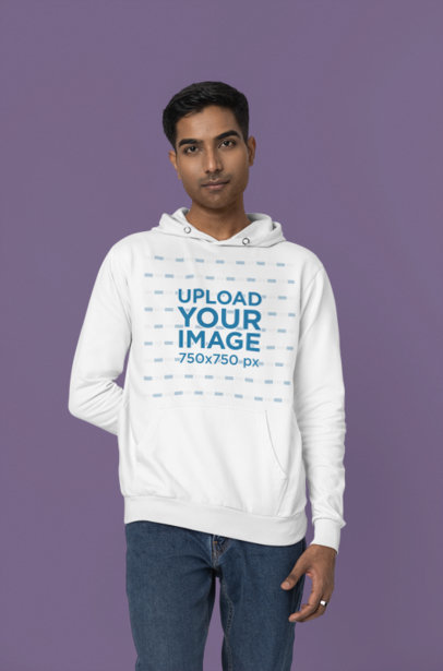 Mockup Featuring a Man Wearing a Pullover Hoodie from Gildan in a Studio