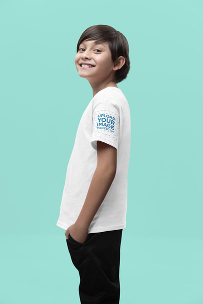 Mockup of a Smiling Boy Wearing a Gildan T-Shirt with a Customizable Short Sleeve