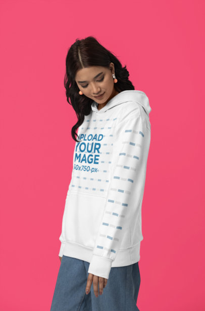 Gildan Hoodie Mockup of a Smiling Woman Posing Against a Colorful Background