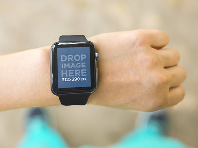 Young Woman Going out for a Run and Wearing Apple Watch Sport