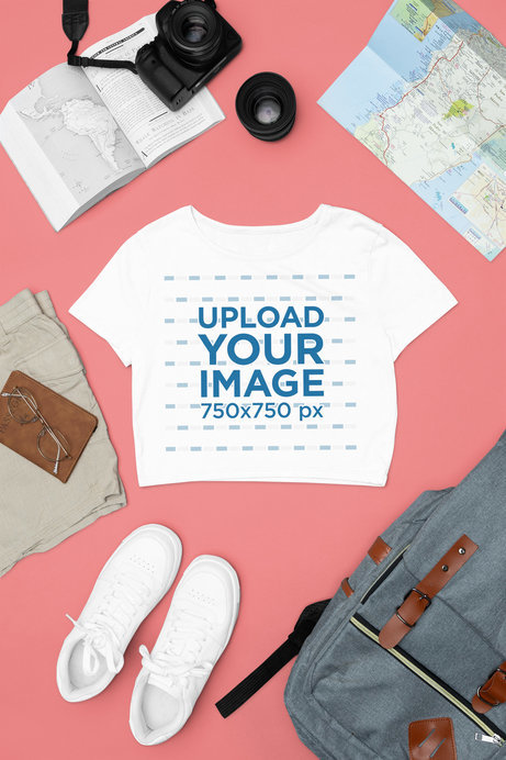 Travel Outfit Mockup Featuring a Bella Canvas Crop Top Next to a Map and a Camera