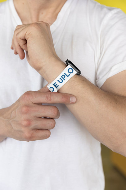Mockup of a Man Posing With His Watch Band