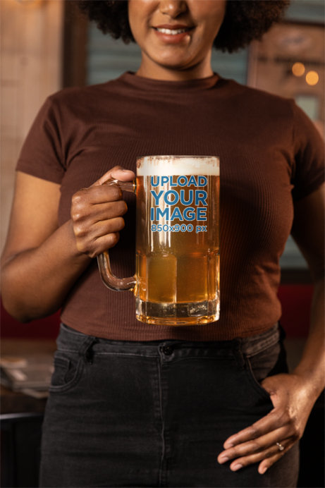 Mockup of a Smiling Cropped-Face Woman Holding a Beer Glass in a Sports Bar