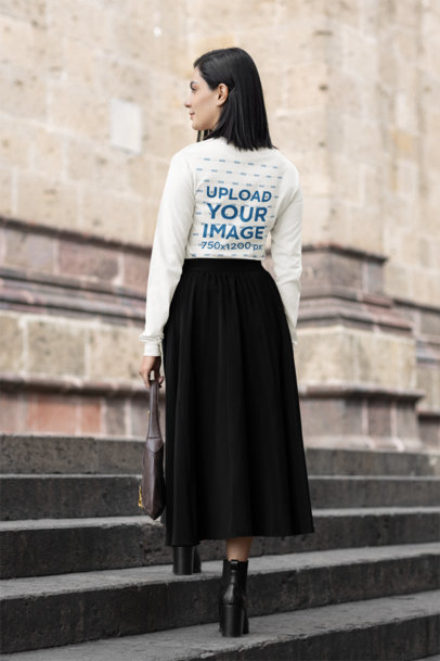 Back-View Bella Canvas Long-Sleeve Tee Mockup of a Woman Posing With a Modest-Styled Outfit