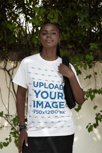 Mockup of a Woman with Long Braids Wearing a Round-Neck Tee 