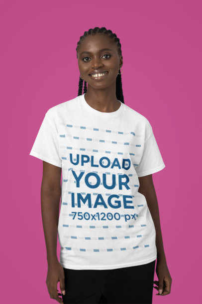 T-Shirt Mockup Featuring a Smiling Woman Standing Against a Colorful Wall