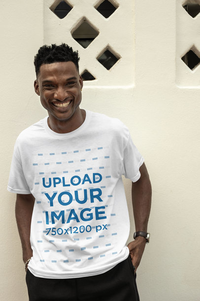 Mockup of a Smiling Man Wearing a Crewneck T-Shirt with Short Sleeves