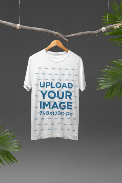 Mockup of a Bella Canvas T-Shirt with a Round Neck Hanging from a Tree Branch m37610