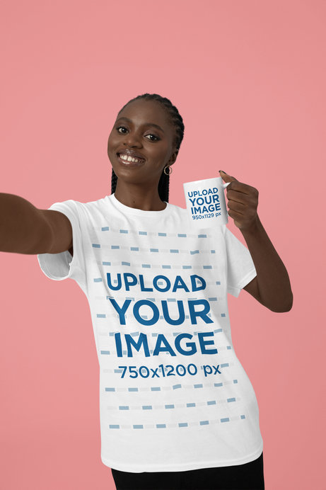 T-Shirt Mockup of a Happy Woman Taking a Selfie While Holding a Coffee Mug in a Studio