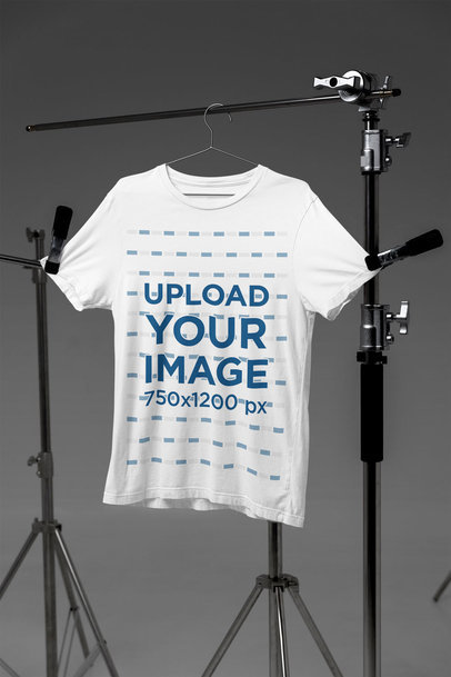 Mockup Featuring a Bella Canvas Round-Neck Tee Placed on Photography Tripods m37614