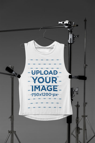 Mockup of a Bella Canvas Tank Top Placed on Professional Photography Tripods m37635