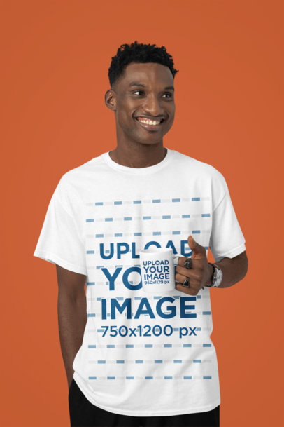 Round-Neck T-Shirt Mockup Featuring a Happy Man Holding a Sublimated Coffee Mug in a Studio m37928