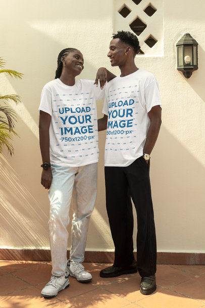Round-Neck T-Shirt Mockup of a Smiling Man and Woman Posing on a Patio