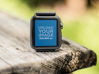 Black Apple Watch on a Wooden Picnic Table At The Park