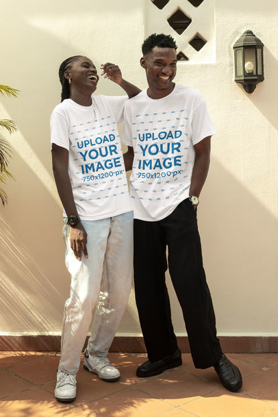Round-Neck T-Shirt Mockup of a Cheerful Man Hugging a Woman While Laughing