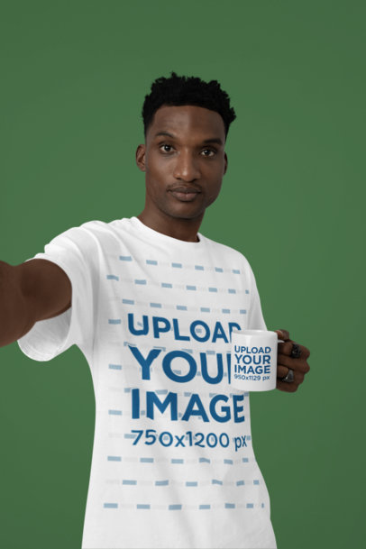 T-Shirt Mockup of a Man Taking a Selfie With an 11 Oz Coffee Mug m37907