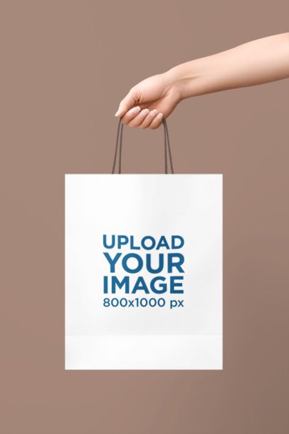 AI-Created Mockup of a Woman's Hand Carrying a Gift Bag Against a Solid Background m37170