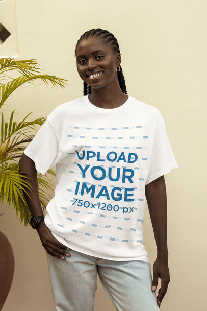 T-Shirt Mockup Featuring a Smiling Woman With a Hand on Her Waist