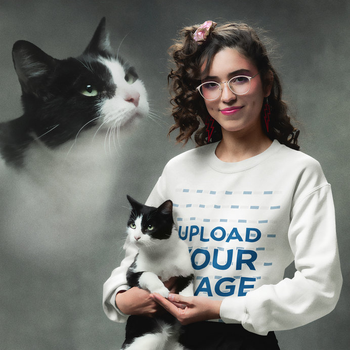 Gildan Sweatshirt Mockup Featuring a Smiling Woman With an 80s Look Posing With a Kitty