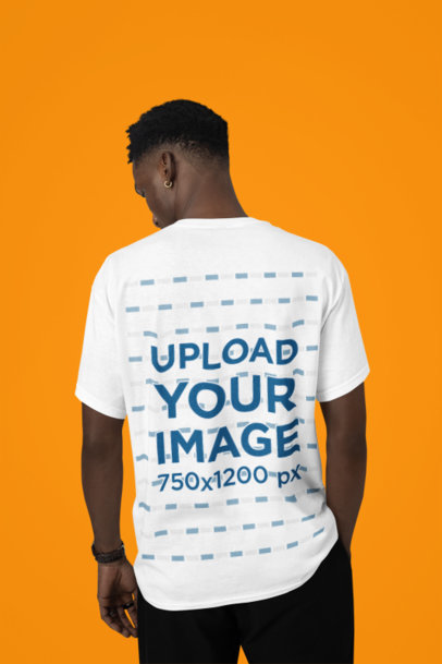 Back-View Tee Mockup Featuring a Man Standing in a Studio