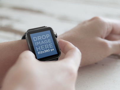 Young Man Using Black Apple Watch Over Wooden Table Mockup Template