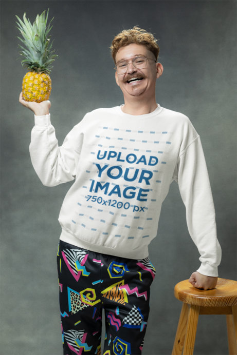 80s-Inspired Gildan Sweatshirt Mockup of a Happy Man Holding a Pineapple 