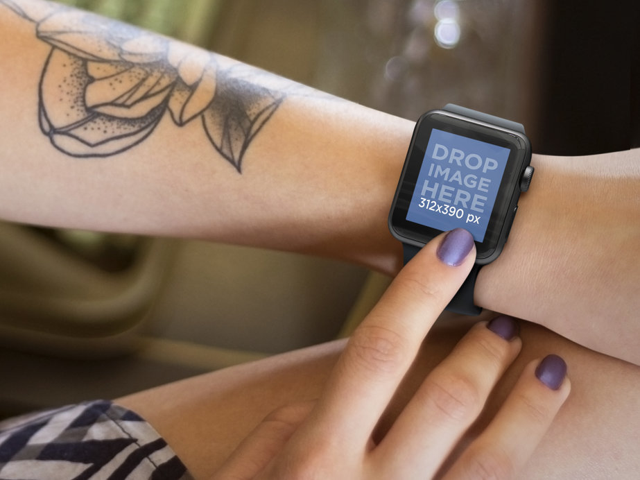 Mockup of a Young Tattooed Woman Using her Black Apple Watch with Vintage Backdrop