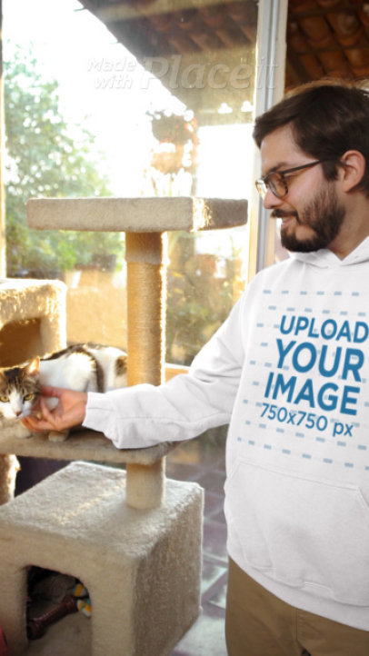 Gildan Pullover Hoodie Video of a Happy Man Petting a Kitty