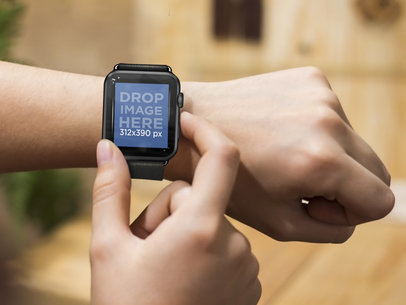 Close-up of Man Using his Black Apple Watch Outdoors Mockup Template