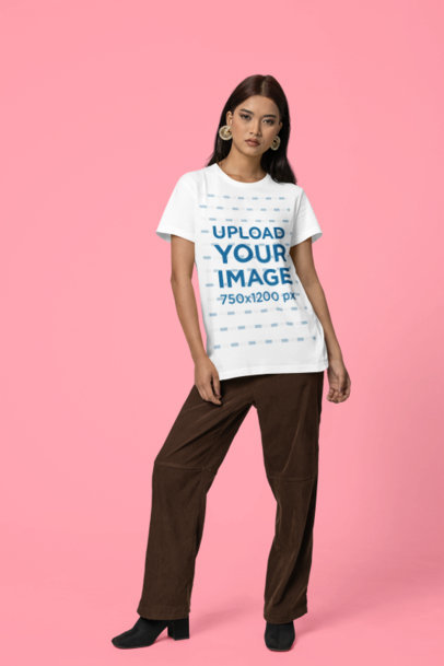 Mockup of a Woman Wearing a Round-Neck T-Shirt from Scott International in a Studio m37752