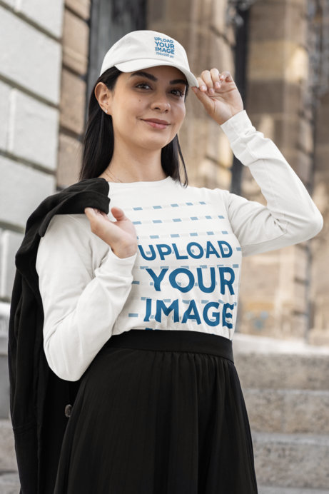 Long-Sleeve Tee and Dad Hat Mockup Featuring a Smiling Woman in a Modest Fashion Outfit