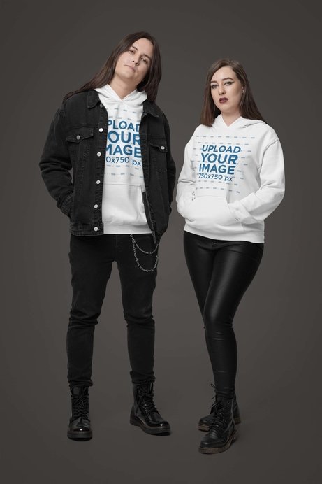 Gildan Hoodie Mockup Featuring a Man and a Woman in a Metalhead-Inspired Look