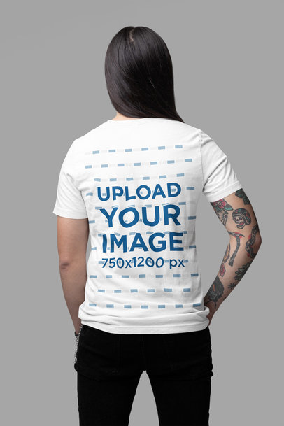 Back-View Bella Canvas T-Shirt Mockup of a Tattooed Man With a Metalhead Style